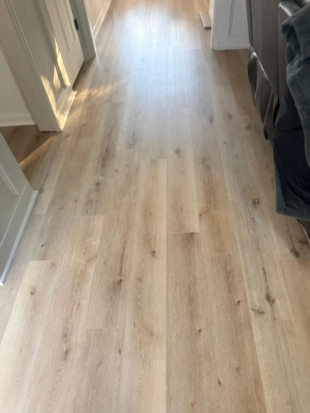 Wide-plank oak running wall to wall.