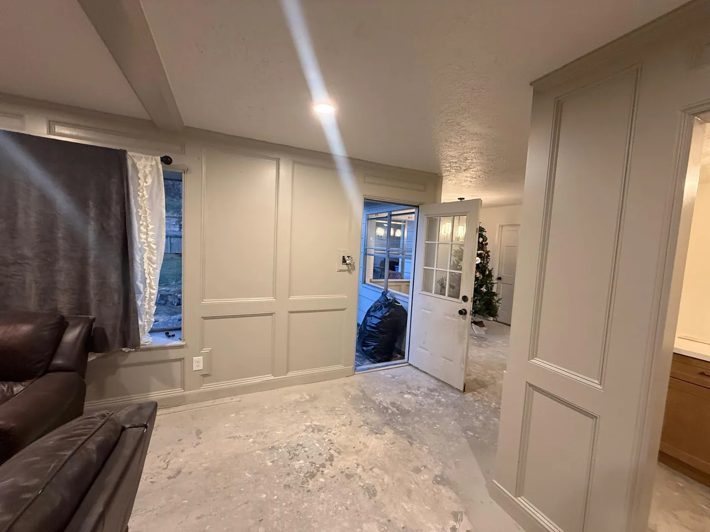 Panel molding, window trim and fresh paint through the living space.