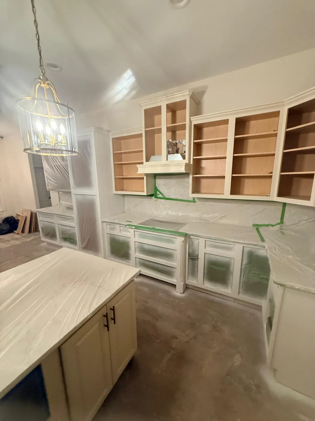 Built-ins boxed in and leveled before doors and shelves.